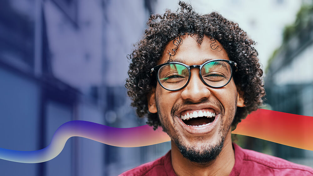 Man smiling wearing glasses
