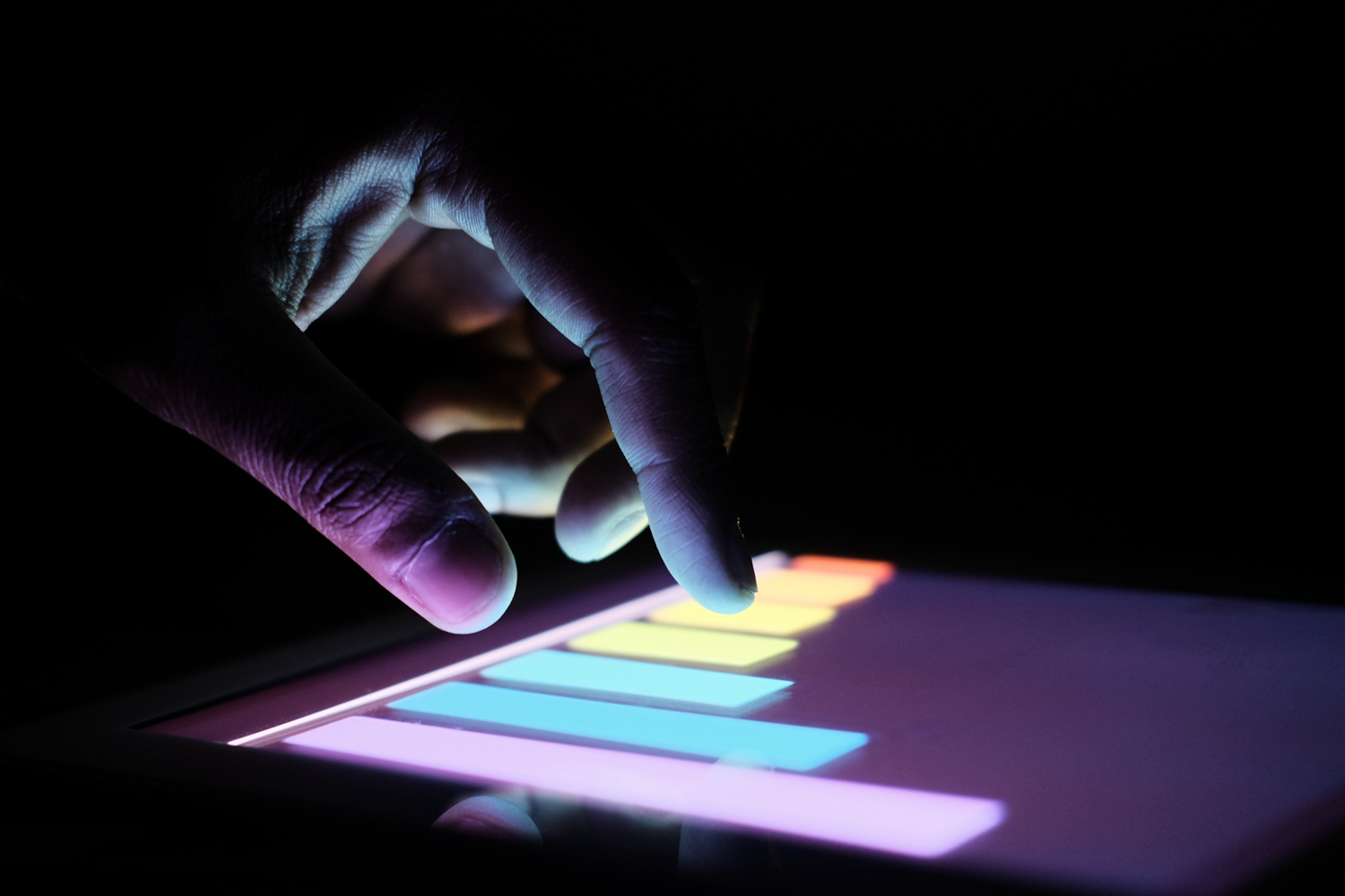 business man hand researching financial strategy on digital tablet