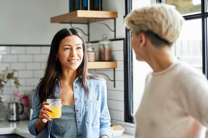 People drinking orange juice